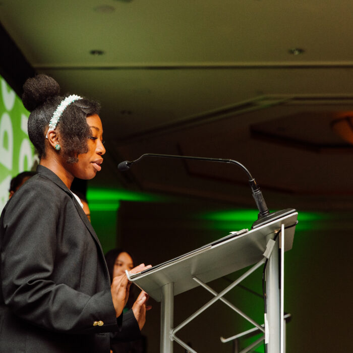 Cathedral Scholar at Adopt-A-Student Foundation Gala giving a speech